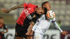 Peru&#039;s Melgar player Paolo Fuentes (L) and Brazil&#039;s Bahia player Saldanha vie for the ball during their closed-door Copa Sudamericana second round football match at the National Stadium in Lima, on October 29, 2020, amid the COVID-19 novel coron