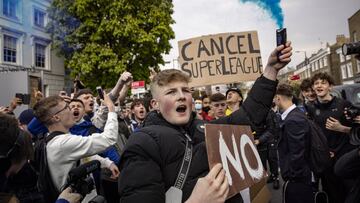 Fans of Chelsea Football Club protest against the European Super League outside Stamford Bridge on April 20, 2021 in London.