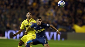 Mario Gaspar y Cristian Pavón.