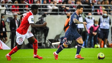 Marshall MUNETSI of Reims and Lionel (Leo) MESSI of PSG during the French championship Ligue 1 football match between Stade de Reims and Paris Saint-Germain on August 29, 2021 at Auguste Delaune stadium in Reims, France - Photo Matthieu Mirville / DPPI
 A