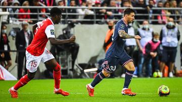 Marshall MUNETSI of Reims and Lionel (Leo) MESSI of PSG during the French championship Ligue 1 football match between Stade de Reims and Paris Saint-Germain on August 29, 2021 at Auguste Delaune stadium in Reims, France - Photo Matthieu Mirville / DPPI
 A