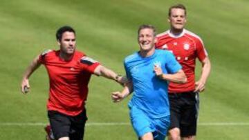 Schweinsteiger y Neuer.