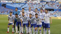 El once del Zaragoza en su &uacute;ltimo partido de la temporada 2021-22 en La Romareda: Cristian &Aacute;lavarez, Grau, Petrovic, Sabin Merino, Llu&iacute;s L&oacute;pez y &Aacute;lvaro Gim&eacute;nez, en la fila de arriba, y Bermejo, Eugeni, Chavarr&iac