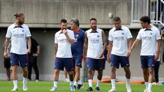 Paris Saint-Germain soccer players, from left, Sergio Ramos, Lionel Messi, coach Christophe Galtier, Neymar, Kylian Mbappe and Marquinhos walk to participate during a PSG soccer lesson Monday, July 18, 2022, in Tokyo. Paris Saint-Germain is in Japan for their pre-season tour and will play three friendly matches against Japan's J1 League teams. (AP Photo/Eugene Hoshiko)