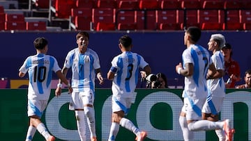 Argentina's forward #07 Maher Carrizo (2nd L) celebrates with teammates after scoring his team's second goal during the 2025 FIFA U-20 World Cup round of 16 football match between Argentina and Nigeria at the National Stadium in Santiago on October 8, 2025. (Photo by Raul BRAVO / AFP)