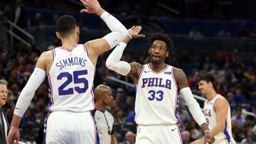 Mar 22, 2018; Orlando, FL, USA; Philadelphia 76ers forward Robert Covington (33) and guard Ben Simmons (25) high five against the Orlando Magic during the first quarter at Amway Center. Mandatory Credit: Kim Klement-USA TODAY Sports