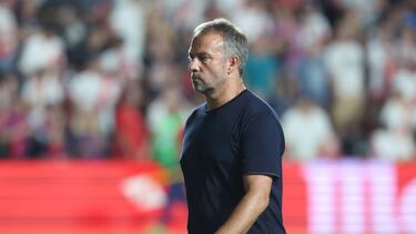 Barcelona's German coach Hansi Flick leaves at the end of the Spanish league football match between Rayo Vallecano de Madrid and FC Barcelona on August 27, 2024. Barcelona won 1-2. (Photo by Pierre-Philippe MARCOU / AFP)