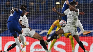 Chelsea&#039;s English striker Tammy Abraham (L) shoots and hits Rennes&#039; Brazilian defender Dalbert Henrique Chagas Estevao (R) in the arm, later being awarded a penalty following a VAR decision, during the UEFA Champions League Group E football matc