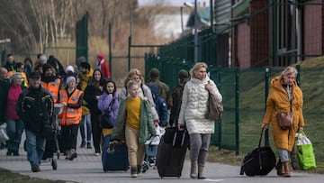 Refugees from Ukraine are seen coming on the Medyka border crossing, April 4, 2022. 