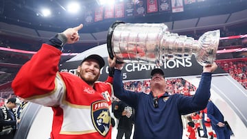 SUNRISE, FLORIDA - JUNE 17: Keith Tkachuk celebrates with his son Matthew Tkachuk #19 of the Florida Panthers after the Panthers defeated the Edmonton Oilers in Game Six of the 2025 Stanley Cup Final at Amerant Bank Arena on June 17, 2025 in Sunrise, Florida. Bruce Bennett/Getty Images/AFP (Photo by BRUCE BENNETT / GETTY IMAGES NORTH AMERICA / Getty Images via AFP)