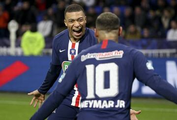 Kylian Mbappé celebrates his hat trick with Neymar.