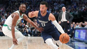 DALLAS, TEXAS - DECEMBER 18: Jalen Brunson #13 of the Dallas Mavericks drives to the basket against Kemba Walker #8 of the Boston Celtics in the first half at American Airlines Center on December 18, 2019 in Dallas, Texas. NOTE TO USER: User expressly acknowledges and agrees that, by downloading and or using this photograph, User is consenting to the terms and conditions of the Getty Images License Agreement.   Tom Pennington/Getty Images/AFP
 == FOR NEWSPAPERS, INTERNET, TELCOS &amp; TELEVISION USE ONLY ==