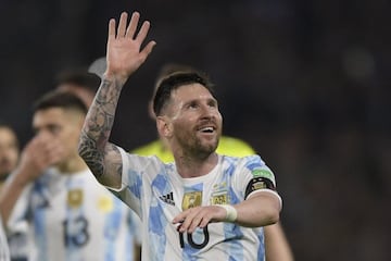 Argentina's Lionel Messi celebrates after the South American qualification football match for the FIFA World Cup Qatar 2022 between Argentina and Venezuela at La Bombonera stadium in Buenos Aires on March 25, 2022. (Photo by JUAN MABROMATA / AFP)