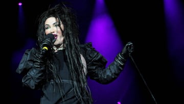 FILE - In this file photo dated Dec. 21, 2012, showing singer of the band Dead or Alive, Pete Burns in concert in London. Burns died on Sunday Oct. 23, 2016, after suffering a cardiac arrest, according to a statement from his management. The Dead or Alive band gained some chart success and known for his non-conformist style, Pete Burns was considered a pop icon. (Ian West / PA FILE via AP)