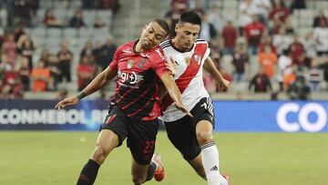 Madson of Brazil&#039;s Atletico Paranaense, left, competes for the ball with Fabrizio Angileri of Argentina&#039;s River Plate during a Recopa Sudamericana first leg final soccer match in Curitiba, Brazil, Wednesday, May 22, 2019. (AP Photo/Giuliano Gomes)