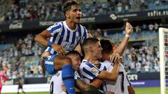 Los jugadores del M&aacute;laga, celebrando el 1-0, obra de Paulino.