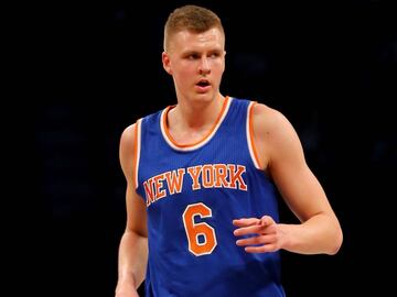 NEW YORK, NY - FEBRUARY 19: Kristaps Porzingis #6 of the New York Knicks celebrates his three point shot in the first half against the Brooklyn Nets at Barclays Center on February 19, 2016 in the Brooklyn borough of New York City. NOTE TO USER: User expressly acknowledges and agrees that, by downloading and or using this photograph, User is consenting to the terms and conditions of the Getty Images License Agreement.   Elsa/Getty Images/AFP
 == FOR NEWSPAPERS, INTERNET, TELCOS &amp; TELEVISION USE ONLY ==