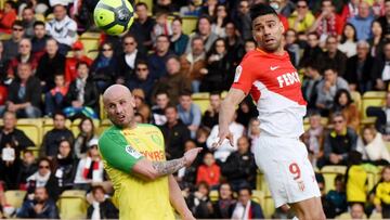 Soccer Football - Ligue 1 - AS Monaco vs FC Nantes - Stade Louis II, Monaco - April 7, 2018  Monaco&#039;s Radamel Falcao in action with Nantes&#039; Nicolas Pallois   REUTERS/Jean-Pierre Amet