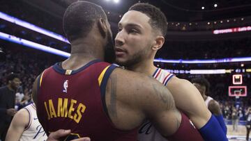 PHILADELPHIA, PA - APRIL 6: LeBron James #23 of the Cleveland Cavaliers hugs Ben Simmons #25 of the Philadelphia 76ers after the game at the Wells Fargo Center on April 6, 2018 in Philadelphia, Pennsylvania. The 76ers defeated the Cavaliers 132-130. NOTE