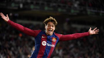 Barcelona's Spanish forward #38 Marc Guiu celebrates after scoring his team's first goal during the Spanish league football match between FC Barcelona and Athletic Club Bilbao at the Estadi Olimpic Lluis Companys in Barcelona on October 22, 2023. (Photo by Josep LAGO / AFP)