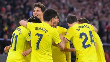 Villarreal&#039;s Nigerian midfielder Samuel Chukwueze (L) celebrates scoring the 1-1 with his team-mates during the UEFA Champions League quarter-final, second leg football match FC Bayern Munich v FC Villarreal in Munich, southern Germany on April 12, 2