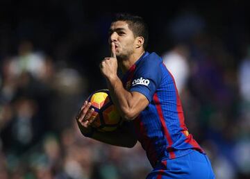 Luis Suarez of FC Barcelona celebrates after scoring the equaliser against Real Betis.