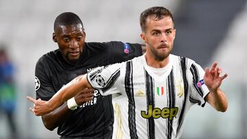 TURIN, ITALY - AUGUST 07: Miralem Pjanic of Juventus runs with the ball during the UEFA Champions League round of 16 second leg match between Juventus and Olympique Lyon at Allianz Stadium on August 07, 2020 in Turin, Italy. (Photo by Valerio Pennicino/Ge