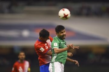 Photo during the action match Mexico vs Costa Rica corresponding the Qualifiers to the FIFA World Cup Russia 2018 at Azteca Stadium. Foto durante el partido Mexico vs Costa Rica correspondiente a las Eliminatorias rumbo a la Copa Mndial de la FIFA Rusia 2018, en el Estadio Azteca, en la foto: Oribe Peralta Mexico y Celso Borges Costa Rica 24/03/2017/MEXSPORT/Osvaldo Aguilar