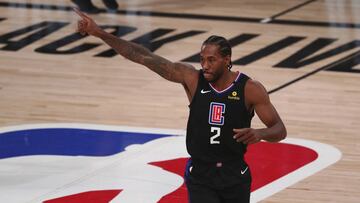 Los Angeles Clippers forward Kawhi Leonard reacts during the first half against the Dallas Mavericks in Game 1 of an NBA basketball first-round playoff series, Monday, Aug. 17, 2020, in Lake Buena Vista, Fla. (Kim Klement/Pool Photo via AP)