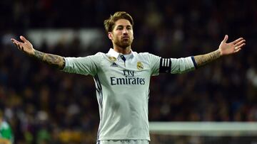 Real Madrid's defender Sergio Ramos celebrates after scoring a goal during the Spanish league footbal match Real Madrid CF vs Real Betis at the Santiago Bernabeu stadium in Madrid on March 12, 2017.