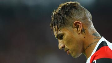 (FILES) In this file photo taken on April 27, 2017 Peruvian Paolo Guerrero (R) of Brazil&#039;s Flamengo gestures during the 2017 Libertadores Cup football match against Brazil&#039;s Paranaense at the Arena da Baixada stadium in Curitiba.
 Peru captain P