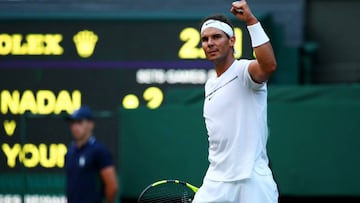 Rafael Nadal of Spain celebrates victory after his Gentlemen&#039;s Singles second round match against Donald Young of The United States on day three of the Wimbledon Lawn Tennis Championships at the All England Lawn Tennis and Croquet Club on July 5, 201