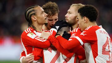 Bayern Munich's Portuguese defender #22 Raphael Guerreiro (C) celebrates scoring with team mates Bayern Munich's German forward #10 Leroy Sane, Bayern Munich's German midfielder #08 Leon Goretzka, Bayern Munich's Austrian midfielder #27 Konrad Laimer and Bayern Munich's German midfielder #42 Jamal Musiala after the opening goal during the German first division Bundesliga football match between FC Bayern Munich and Union Berlin in Munich on January 24, 2024. (Photo by MICHAELA STACHE / AFP) / DFL REGULATIONS PROHIBIT ANY USE OF PHOTOGRAPHS AS IMAGE SEQUENCES AND/OR QUASI-VIDEO