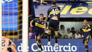 Boca Juniors' Uruguayan forward #16 Miguel Merentiel (L) celebrates scoring his team's first goal during the Argentine Professional Football League 2025 Clausura Tournament round of 16 match between Boca Juniors and Talleres de Cordoba at La Bombonera Stadium in Buenos Aires on November 23, 2025. (Photo by ALEJANDRO PAGNI / AFP)