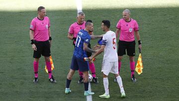 SEVILLE, SPAIN - JUNE 23: Marek Hamsik of Slovakia interacts with Sergio Busquets of Spain during the pre-match coin toss prior to the UEFA Euro 2020 Championship Group E match between Slovakia and Spain at Estadio La Cartuja on June 23, 2021 in Seville,