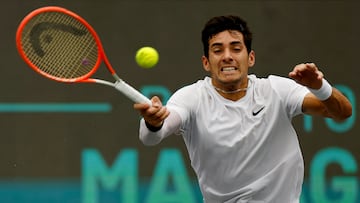Tennis - Davis Cup - Group C - United States v Chile - Hengqin International Tennis Center, Zhuhai, China - September 11, 2024 Chile's Cristian Garin in action during his match against Reilly Opelka of the U.S. REUTERS/Tyrone Siu