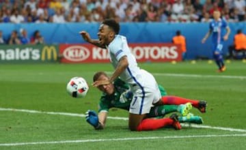 Raheem Sterling brought down by Hannes Halldorsson. Wayne Rooney scored from the spot.