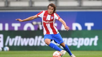 Atletico's Javi Serrano plays the ball during a friendly football match Wolfsburg v Atletico Madrid in Wolfsburg, Germany, on July 31, 2021. (Photo by CARMEN JASPERSEN / AFP)