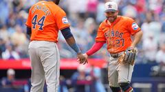 TORONTO, ON - JULY 4: Jose Altuve #27 and Yordan Alvarez #44 of the Houston Astros celebrate defeating the Toronto Blue Jays in their MLB game at the Rogers Centre on July 4, 2024 in Toronto, Ontario, Canada.   Mark Blinch/Getty Images/AFP (Photo by MARK BLINCH / GETTY IMAGES NORTH AMERICA / Getty Images via AFP)