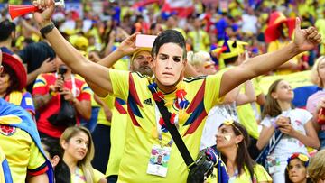 Muchos aficionados de Colombia acuden a los partidos de su selección con caretas de James.