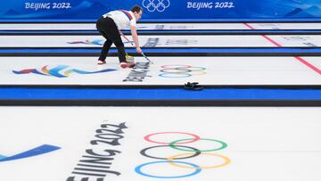 Czech Republic's Tomas Paul competes during the mixed doubles round robin session 1 game of the Beijing 2022 Winter Olympic Games curling competition against Norway, at the National Aquatics Centre in Beijing on February 2, 2022. - Czech Republic won
