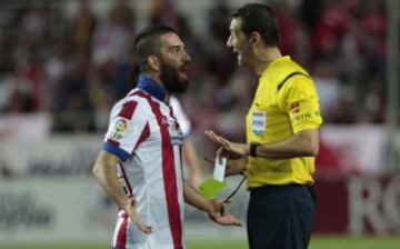 Arda Turan y Clos Gomez 