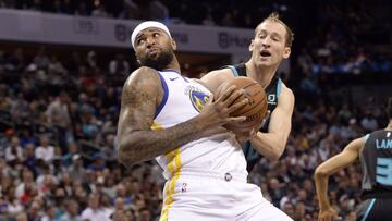 Feb 25, 2019; Charlotte, NC, USA; Golden State Warriors forward center DeMarcus Cousins (0) looks to shoot as he is defended by Charlotte Hornets forward center Cody Zeller (40) during the first half at the Spectrum Center. Mandatory Credit: Sam Sharpe-USA TODAY Sports