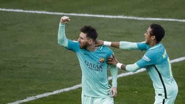 Lionel Messi celebrates his goal against Atletico Madrid at the Vicente Calderon.