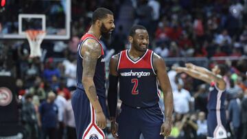 Apr 28, 2017; Atlanta, GA, USA; Washington Wizards guard John Wall (2) celebrates a play with forward Markieff Morris (5) in the closing minutes of their game against the Atlanta Hawks in game six of the first round of the 2017 NBA Playoffs at Philips Arena. Mandatory Credit: Jason Getz-USA TODAY Sports