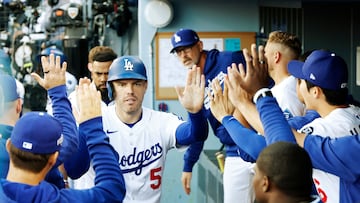 LOS ANGELES, CALIFORNIA - OCTOBER 16: Freddie Freeman #5 of the Los Angeles Dodgers celebrates scoring a run in the sixth inning after a throwing error by Abner Uribe #45 of the Milwaukee Brewers in game three of the National League Championship Series at Dodger Stadium on October 16, 2025 in Los Angeles, California. Harry How/Getty Images/AFP (Photo by Harry How / GETTY IMAGES NORTH AMERICA / Getty Images via AFP)