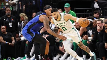 Boston Celtics forward Jayson Tatum (0) is guarded by Orlando Magic forward Paolo Banchero (5) in the second quarter during game four of first round for the 2025 NBA Playoffs at Kia Center.
