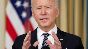 FILE PHOTO: U.S. President Joe Biden speaks in the State Dining Room at the White House in Washington, U.S., March 15, 2021. REUTERS/Kevin Lamarque/File Photo