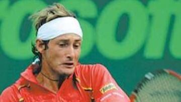 <b>ENTONÁNDOSE. </b>Juan Carlos Ferrero acabó pronto con Brendan Evans.