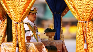BANGKOK, THAILAND - NOVEMBER 5: Thai Crown Prince Vajiralongkorn sits on the Royal Barge on the Chao Phraya river during the Royal celebrations on November 5, 2007, in Bangkok, Thailand. Thailand's magestic royal barge procession, held to celebrate King Bhumibol Adulyadej's coming 80th birthday, swept along the Chao Phraya river without him. King Bhumipol, The world longest reigning monarch, has been in hospital since October 13 after suffering a blood clot in his brain. (Photo by Chumsak Kanoknan/ Getty Images)